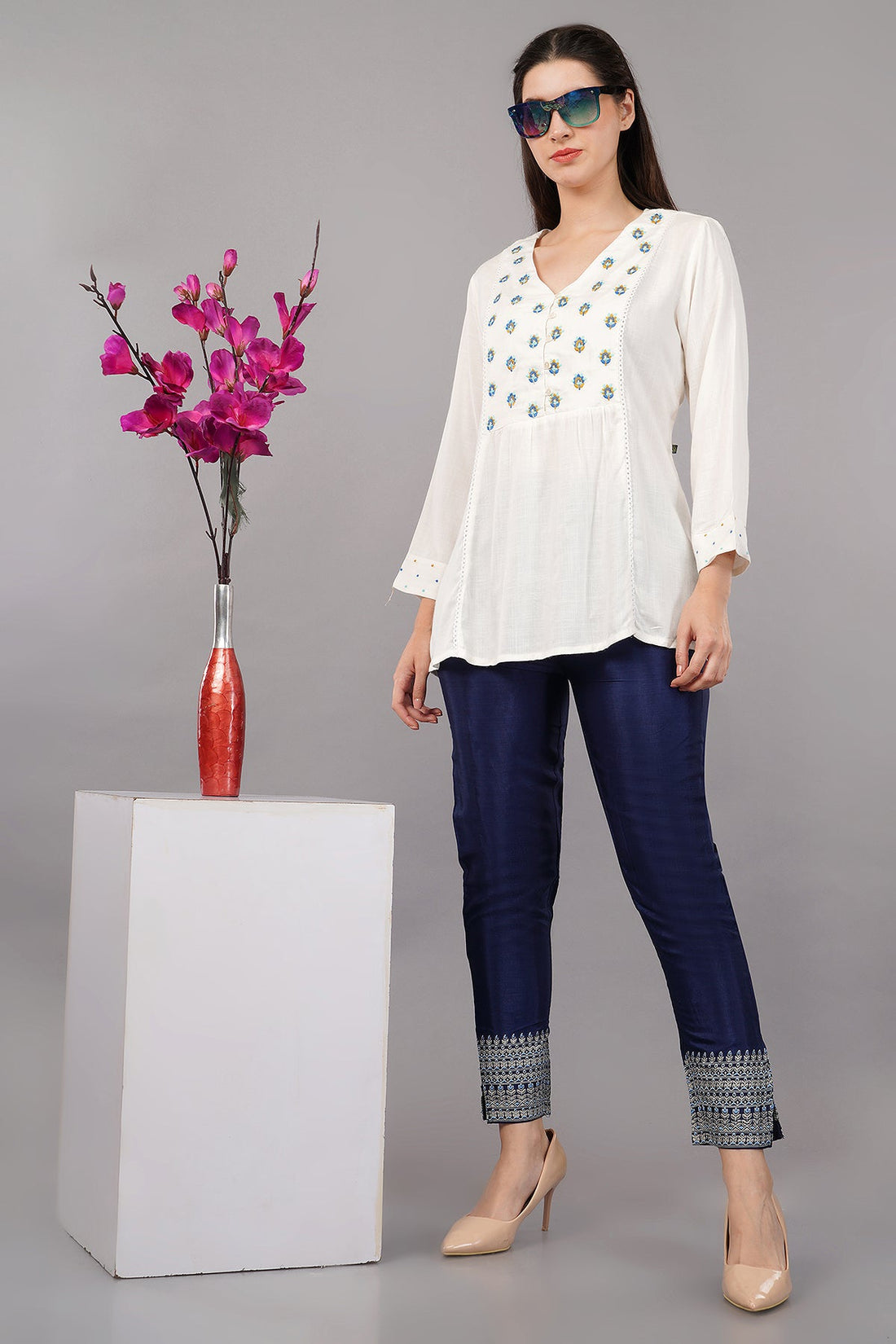 Aqua Solid Flared Embroidered Top