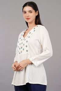 Aqua Solid Flared Embroidered Top