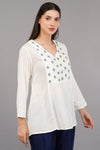 Aqua Solid Flared Embroidered Top