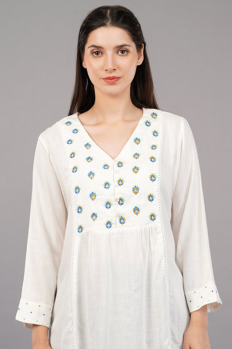 Aqua Solid Flared Embroidered Top