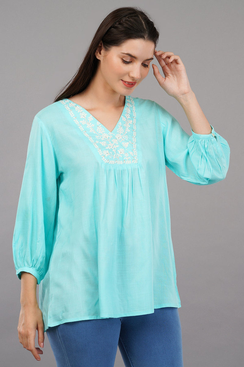 Aqua Solid Flared Embroidered Top